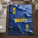 toledo-rockets-rug-cracked-surface-design-blue-best-selling.webp