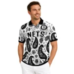 brooklyn-nets-polo-shirt-customized-paisley-florals-black-white-best-selling.webp